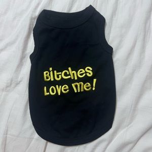 Graphic dog clothing , black with gold letters , for small dogs.
